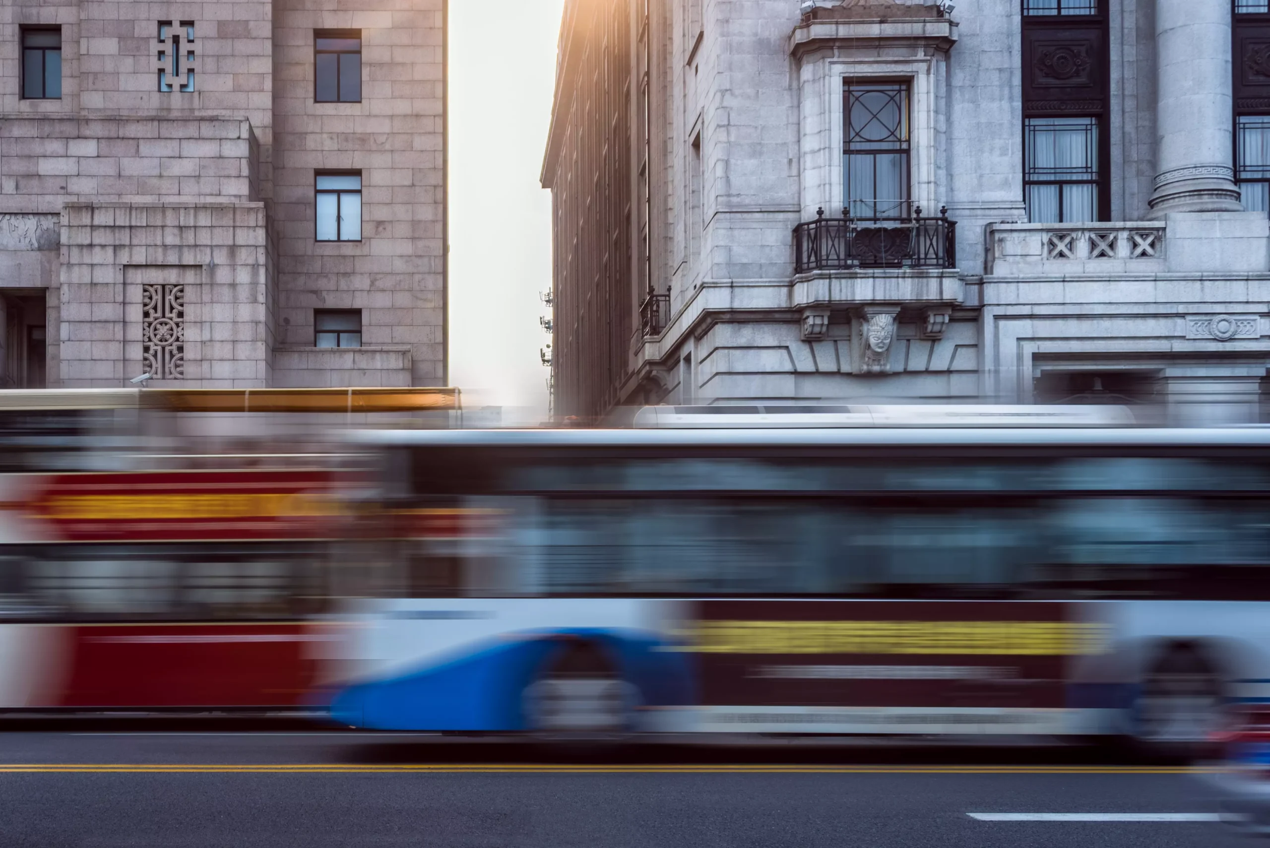 Two bus driving fast